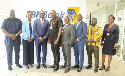 Theophilus Yartey (left), Editor, Graphic, and Victor Yaw Asante (3rd from right), Managing Director, FBNBank, with the executive team from FBNBank and Graphic during the visit. Picture: ESTHER ADJORKOR ADJEI