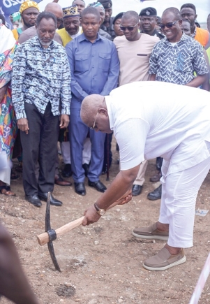 Henry Quartey, Greater Accra Regional Minister, cutting the sod for the commencement of the project. Those in the picture include Alexander Nii-Noi Adumuah (left), the MCE, and Abu Ramadan, MP for Adentan
