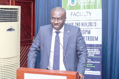 George B. Asare-Afriyie (inset), lecturer, GIMPA Faculty of Law, making his presentation at the GIMPA Law Faculty lecture. Picture: CALEB VANDERPUYE