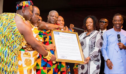 Prof. Naana Jane Opoku-Agyemang, (3rd from right) receiving her award from the organisers of the Emotional Intelligence Summit