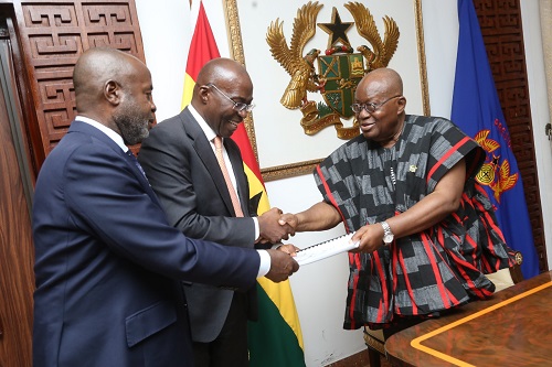 he Chief Executive Officer (CEO) of GIADEC, Mr. Michael Ansah (middle) and the CEO of Rocksure International, Mr. Kwasi Osei Ofori, presenting the Mineral Resource Estimate report to President Akufo-Addo at the Jubilee House in Accra.