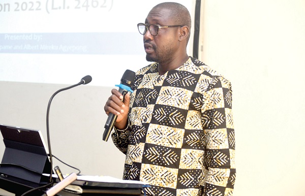 Mustapha Seidu (right),  Director of Nature and Development Foundation, addressing participants in the workshop  