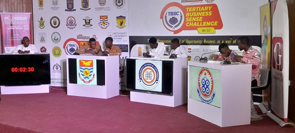 Representatives of the three universities answering questions from the Quiz Master (siting left), Alhassan Yusif Trawule.