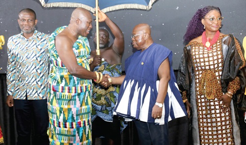 President Akufo-Addo (2nd from right) shaking hands with Odeneho Kwafo Akoto III, Paramount Chief of Akwamu Traditional Area,  at the summit in Accra. With them are Mark Okraku Mante (left), Deputy Minister, Tourism, Arts and Culture, and Juliet Yaa Asantewaa Asante (right), CEO, National Film Authority. Picture: SAMUEL TEI ADANO