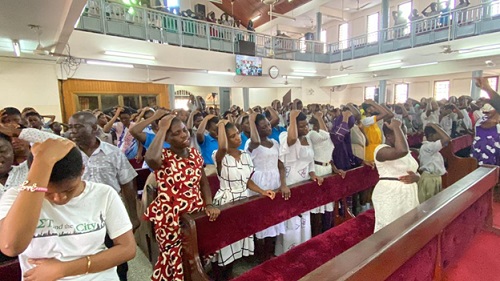 A section of the attendees praying. 