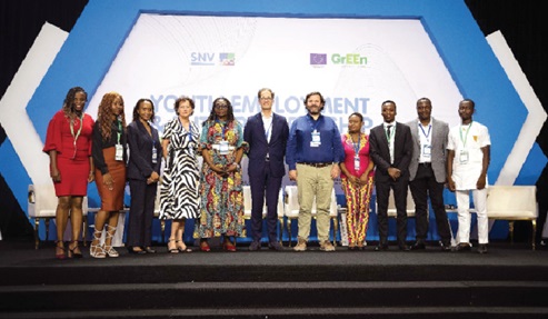 Gloria Bortele Noi (5th from left), Director of Policy Planning, Monitoring and Evaluation at the Ministry of Employment and Labour Relations, with the participants 