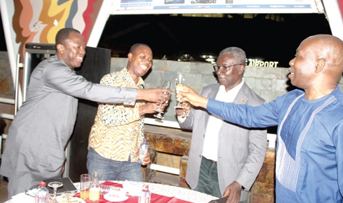 Dr Opoku Ware Ampomah (left), CEO Korle Bu Teaching Hospital; Prof. Mawutor Tettey (right), acting Director, National Cardiothoracic Centre, Prof. Kwabena Frimpong-Boateng (2nd from right), and Ignatius Kwame Asare, Retired General Manager, West Africa Quarries Limited, in a toast. Picture: ESTHER ADJORKOR ADJEI