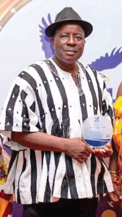 Noble Francis Essel-Okyeahene, Director of the Young Executive School, with his award