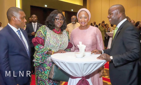 Samuel Abu Jinapor (right) interacting with Samira Bawumia. With him is George Mireku Duker (left), Deputy Minister of Lands and Natural Resources
