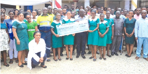 The scholarship beneficiaries with officials of the Edikan Trust Fund and Perseus Mining Ghana Limited