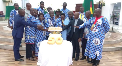 Rt Rev. Dr Lt Col Bliss Divine Kofi Agbeko (3rd from right), Moderator of the General Assembly of the Evangelical Presbyterian Church Ghana, and the leadership of the 37 Military Methodist Presby Church cutting the 50th anniversary cake