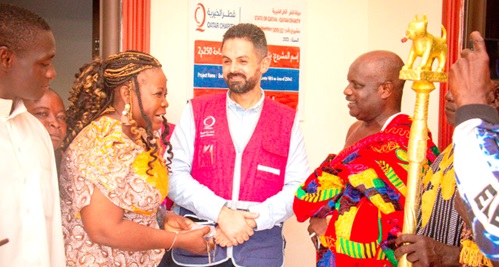 Vida Efua Afful (2nd from left), Atiwa East District Health Director presenting the facility to Nana Osa Barima Duah II (right), chief of Kadewaso, while Hasan Owda (middle), Country Director of Qatar Charity looks on. INSET: The health facility