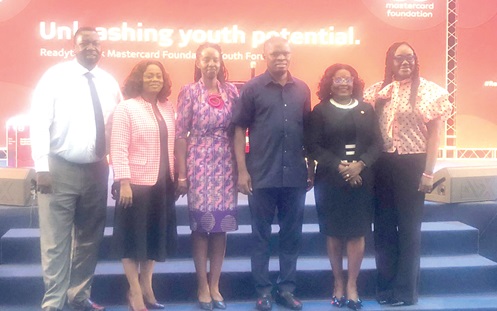 Mustapha Ussif (4th from left), Minister of Youth and Sports, with Rica Rwigamba (3rd from left), Country Director of Mastercard Foundation, and Nana Essilfuah Tamakloe of Absa 