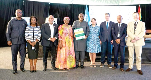 Ambrose Dery (middle), Minister for the Interior, with some of the participants in the meeting in Accra
