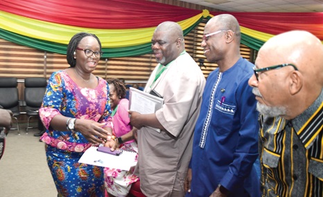 Gifty Twum Ampofo, a Deputy Minister of Education, interacting with Dr Benson Banda (2nd from left), President of SMASE,  Prof. Edward Appiah (3rd from left), Director General, NaCCA, and Anis Haffar (right),  Chairman of the Board of NTC