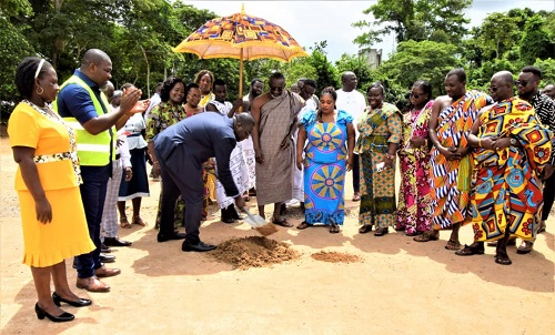 Sammi Awuku cuts sod for multi-purpose sports courts in Okuapeman School