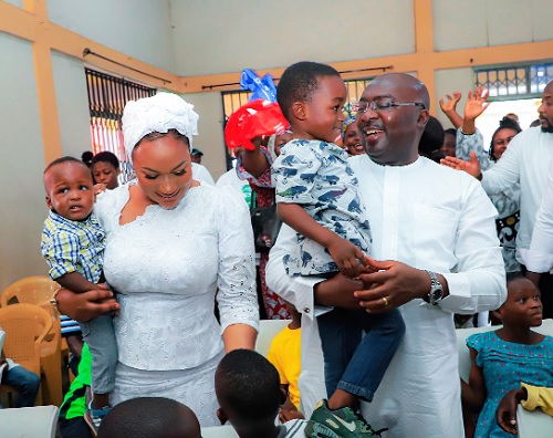 Dr Bawumia, Vice-President and wife Samira interacting with some of the children at the home