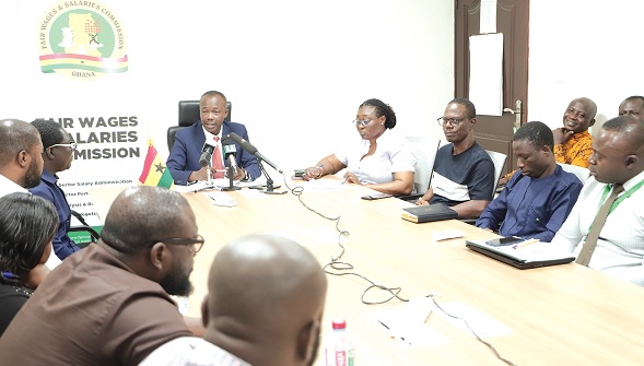 Benjamin Arthur (head of table), Chief Executive of the Fair Wages and Salaries Commission, addressing participants during the media briefing. Picture: EDNA SALVO-KOTEY