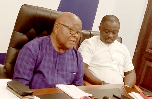 Prof. Mike Oquaye (left), Chairman of the Presidential Elections Committee, speaking to the media. With him is William Yamoah, Secretary to the committee