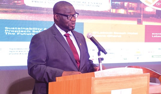 Dr Kwabena Ampofo Appiah (left), Managing Director of State Housing Company Ltd, adressing the opening session of the Africa Real Estate Conference in Accra