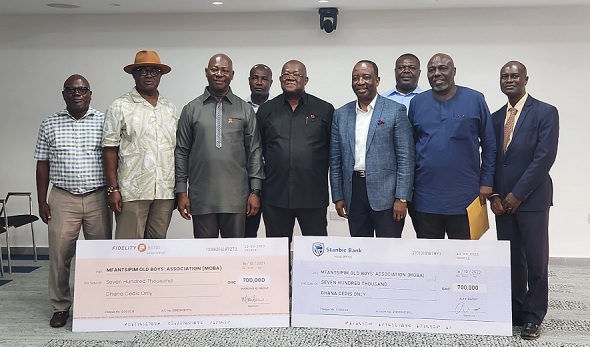 Some members of the Mfantsipim Old Boys Association with the two dummy cheques