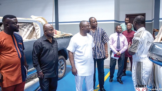 Dr Fred Kyei Asamoah (3rd from left), Director-General of CTVET, and his team being briefed during a visit to the University of Ghana Toyota Training Centre in Accra