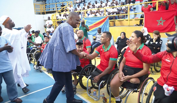 Mustapha Ussif, the Minister of Youth and Sports, welcoming Moroccan athletes during yesterday’s ceremony. With him is Samson Deen (left), President of the African Paralympic Committee. Pictures: SAMUEL TEI ADANO