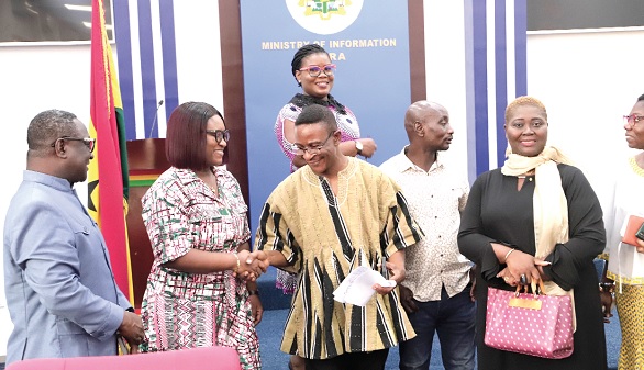 David Owusu-Amoah (3rd from left), acting Chief Director, ISD, exchanging pleasantries with Supt (rtd) Afia Tengey (2nd from left), Head, Public Engagement of Parliament. Wth them are officials of ISD and Parliament. Picture: EDNA SALVO-KOTEY