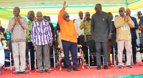 President Akufo-Addo (hand raised) responding to cheers from the crowd. With him are from left: Joseph Boahen Aidoo, CEO, COCOBOD, Simon Osei-Mensah, Ashanti Regional Minister; Bryan Acheampong, Minister of Agric; and Peter Mac Manu, Board Chairman, COCOBOD