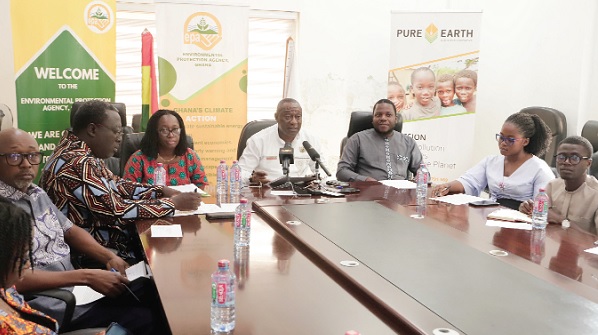 Dr Henry Kwabena Kokofu (4th from right), Executive Director, Environmental Protection Agency, making a statement during the media briefing