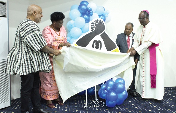 Adelaide Anno Kumi (2nd from left), Chief Director, Ministry for the Interior, unveiling the logo for the Peace Campaign. Assisting her are Dr Charles Abani (left), UN Resident Coordinator, Ghana, Nana Dr S.K.B. Asante (2nd from right), Board Chairman, National Peace Council and the Omanhene of Asante Asokore, and Most Rev. Emmanuel Kofi Fianu, Catholic Bishop of Ho. Picture: ERNEST KODZI