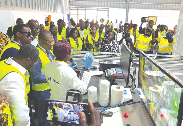 George Mireku Duker (3rd from left), Deputy Minister of Lands and Natural Resources, being briefed at the commissioning of the photonassay laboratory by Intertek Minerals Ghana