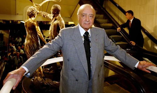 Harrods chairman Mohamed al-Fayed unveils a memorial in 2005 to his late son Dodi and the UK's Diana Princess of Wales at Harrods in London [File: Paul Hackett/Reuters]