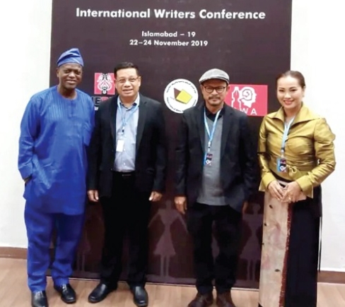 With colleague writers at the conference
