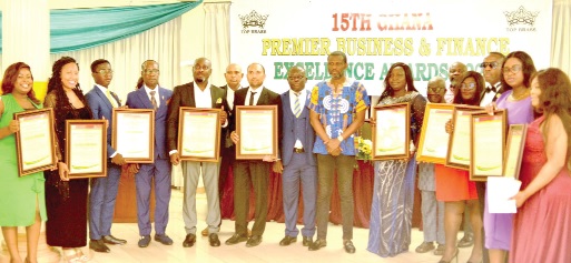 Mark Okraku Mantey (middle), Deputy Minister of Tourism, Arts and Culture, Ralph Ayitey (arrowed), Vice-President, Association of Ghana Industries, and some of the award winners at the 15th edition