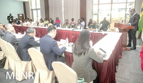 Samuel Abu Jinapor (right),  Minister of Lands and Natural Resources, speaking at the China-Ghana Innovation Resources event