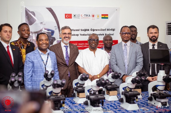 Alhaji Hafiz Adam - in white smock, Chief Director, Ministry of Health with representatives from TIKA and the School of Biomedical and Allied Health Sciences, University of Ghana, Korle Bu Teaching Hospital after the presentation