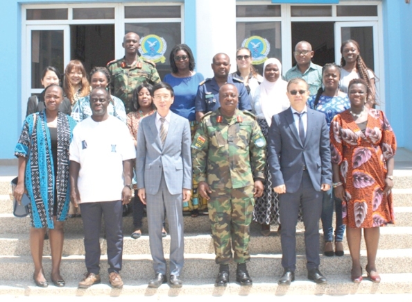 Major General Richard Addo Gyane (3rd from right), Commandant of KAIPTC; Mochizuki Nisanobu (3rd from left), Japanese Ambassador to Ghana; Sukhrob Khoshmukhamedov, Deputy Resident Representative of the UNDP, and some officials and participants