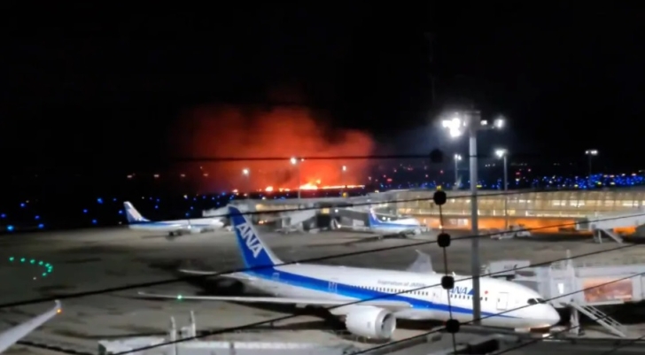 Japan Airlines jet bursts into flames after collision with earthquake relief plane at Tokyo Haneda airport