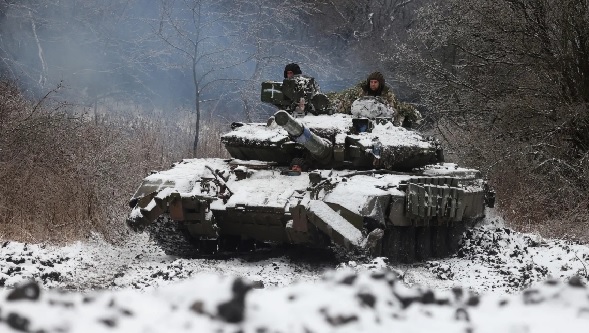 Ukrainian soldiers drive a tank near the town of Bakhmut on December 13, 2023. February 24 will mark the two-year anniversary of Russia's full-scale invasion, with no immediate end in sight.
