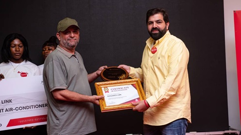 The Founder of Hassanco Link, Mr Mohammed T. Faili recieving a certificate of recognition from the Husein Jabar, Managing Director of Inamar Company Limited The Founder of Hassanco Link, Mr Mohammed T. Faili recieving a certificate of recognition from the Husein Jabar, Managing Director of Inamar Company Limited