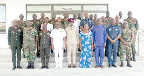 Capt. Cecilia Erzuah (5th from right) and her parents (in civilian clothes) with Vice Admiral Seth Amoama (4th from left) and other members of the Military High Command.  Picture: DELLA RUSSEL OCLOO