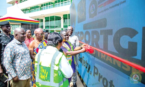 Kwaku Ofori Asiamah (middle), Minister of Transport, launching the TransportGhana with other NSRA officials