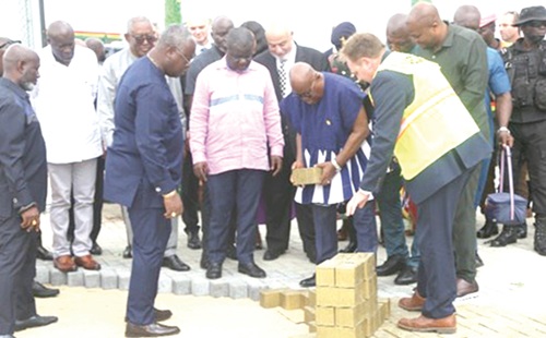 President Akufo-Addo (2nd from right) laying a brick for the next stage of the expansion project at the MPS, Tema. With them is Kwaku Ofori Asiamah (4th from left), Minister of Transport, and Mohamed Samara (3rd from right), CEO, MPS. Picture: SAMUEL TEI ADANO