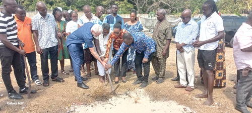 Prof. David Doodo-Arhin (right), the Director of IAST, being assisted by Zanetor Rawlings (2nd from right) and Julien Lucas (left), the Head of Cooperation of the French Embassy, to cut the sod for the construction of the platform for the pyrolysis plant at Osu