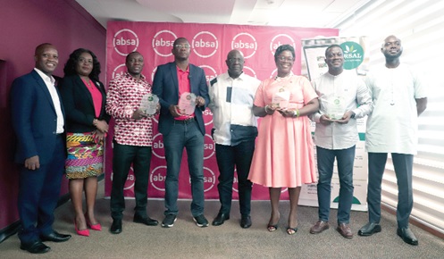 Kwesi Korboe (4th from right), Chief Executive Officer, GIRSAL, with Kwasi Duah (right), Deputy Chief Executive Officer of GIRSAL, and the awardees after the awards ceremony. Picture: EDNA SALVO-KOTEY