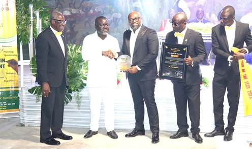 Kwaku Ofori Asiamah (2nd from left), Minister of Transport, presenting the Chartered Institute of Supply Chain Management Man of the Year 2023 award to Daniel McKorley (middle), CEO, McDan Group of Companies. Looking on is Richard Okrah (left), President, Chartered Institute of Supply Chain Management. Picture: ELVIS NII NOI DOWUONA