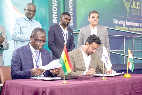 Dr Joseph Siaw Agyepong (left), Founder and Executive Chairman of the Jospong Group of Companies, and Manish Dabkara (right), CEO of EKI Energy Services, signing the memorandum of understanding. Picture: Caleb Vanderpuye 
