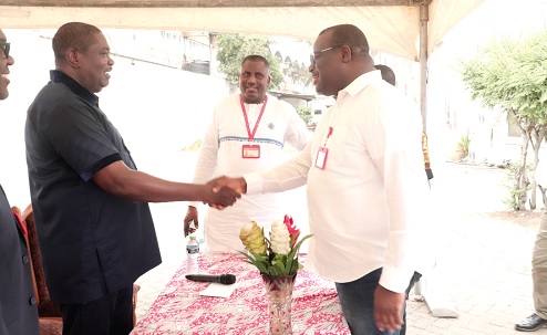 Rev. Dr Ebenezer Markwei (left), the General Overseer of the Living Streams International, exchanging pleasantries with Theophilus Yartey (right), Editor, Graphic, after the ceremony. With them is Franklin Sowa (2nd from right), Director, Marketing and Sales, GCGL