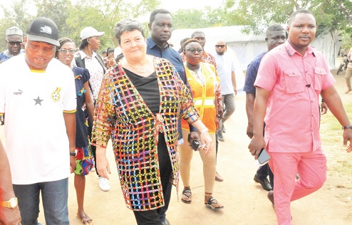 Virginia Palmer (middle), US Ambassador to Ghana; Samuel Okudzeto Ablakwa (left), MP for North Tongu; Dr Yaw Osei Adutwum (arrowed), Minister of Education, and other dignitaries touring the Agbetikpo DA Basic School camp